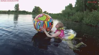 Alla swims in an inflatable ring and wears an inflatable vest and deflates a beach ball naked!!!