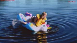 Alla wears an automatic inflatable vest, and rides very hot on an inflatable unicorn on the lake and falls into the water, a hot ride on an inflatable unicorn, an incredible rescue!!!
