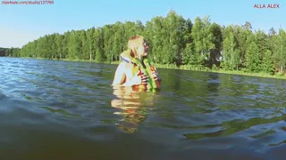 Alla swims on the lake and wears an inflatable vest!!!