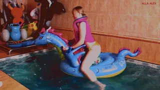 Alla hot fucks a beach ball riding an inflatable dragon in the pool!!!