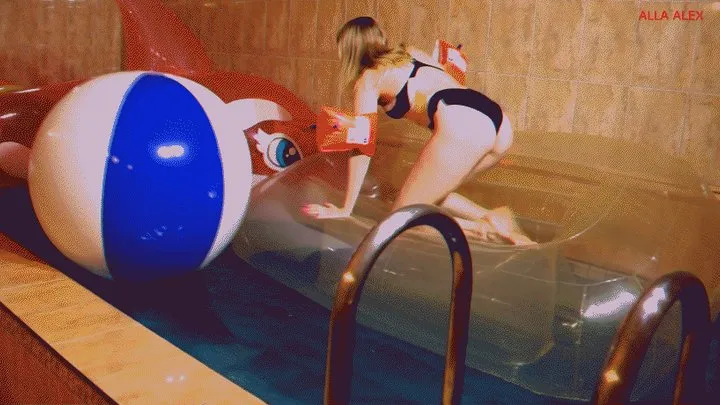 Alla swims in the pool on a huge inflatable whale and a transparent inflatable sofa and an inflatable deck chair and plays with a beach ball!!!