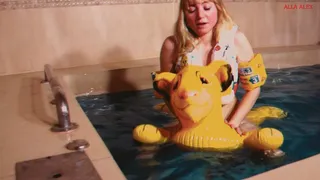 Alla hot fucks an inflatable lion in the pool and gets an orgasm!!!