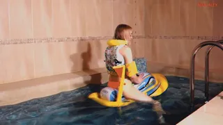 Riding a small inflatable scooter in the pool and blowing it off at the end of the video!!!