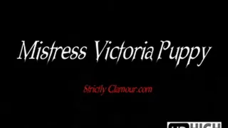 Mistress Victoria Puppy in Leather with Riding Crop