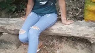 Latina girl hocking loogies on the ground