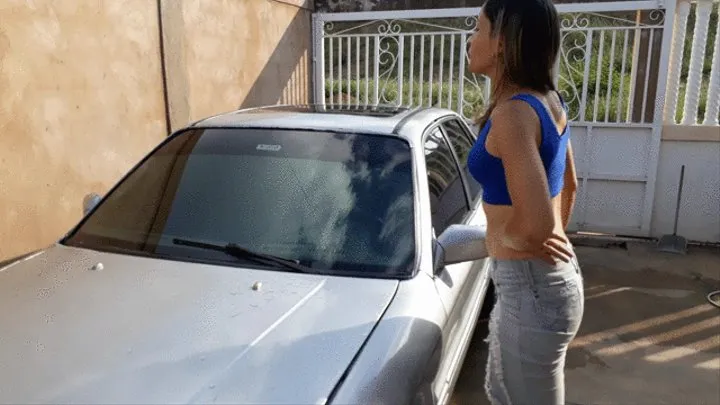 Venezuelian girl hocking loogies on her boyfriends car