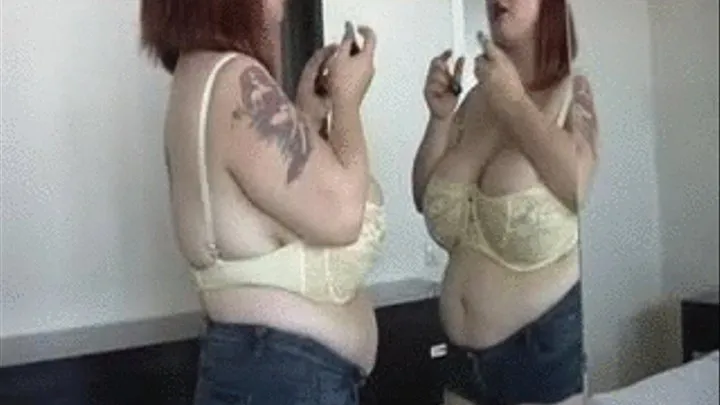 Roxanne Miller milking target in mirror