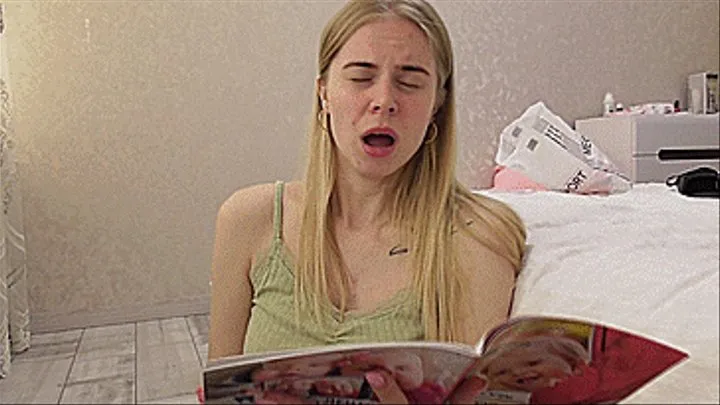 SNEEZING PREVENTS THE BLONDE FROM READING!