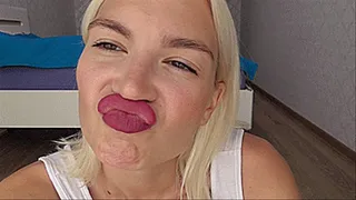 A VERY SEXY BLONDE SNIFFS HER PINK LIPS AND ENJOYS IT!
