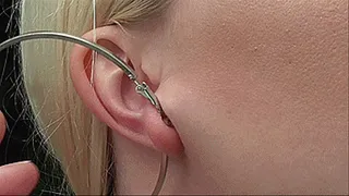 Sexy earlobes in big round earrings!