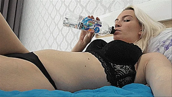 THE BLONDE DRINKS WATER ON THE BED AND HICCUPS A LOT!