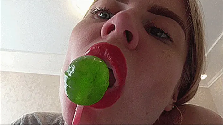 LICKING A BIG GREEN CHUPACHUPS!