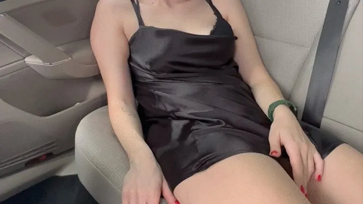 A DOLL IN A SATIN DRESS IN THE CAR!