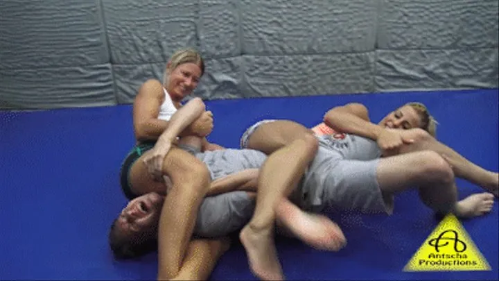 Antscha and Sheena doublescissor on a guy!