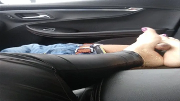 Car footjob in leather pants