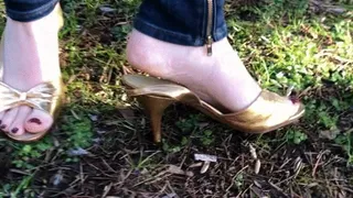 High Heels sandals sank deep into the soft green grass, walking in a public park :)