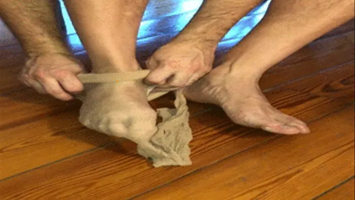 My husband enjoys wearing nude woman stockings! EXTREME SMELLY MAN FEET!!Soles shown!!