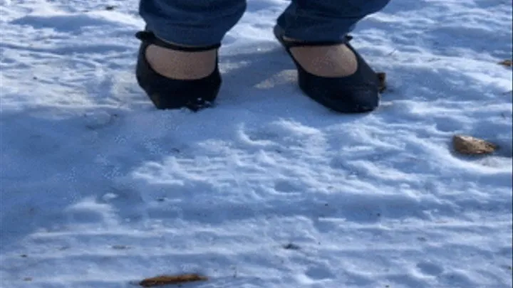 Dasha Kelly is wearing a pair of old heels in the freezing cold,the heels sank deep into the snow and she tap really hard on the ice!