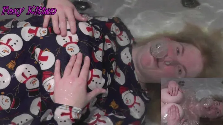 Foxy Blows Bubbles and Titty Squeezes in her Christmas Top