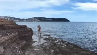 Oiling Up On The Beach