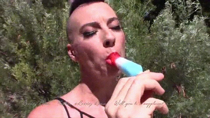 Roxxxy eats a popsicle