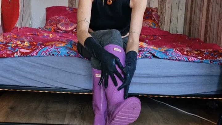 Me with my purple hunter boots and latex gloves on my bed