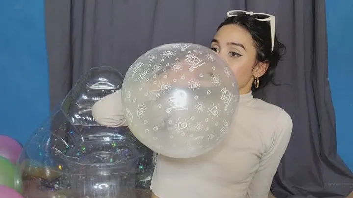 Marianna inflates crystal balloon with balloons inside