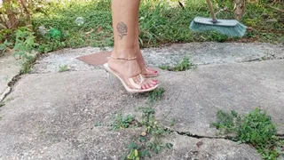 Scratching my feet while cleaning my backyard in high heels (3)