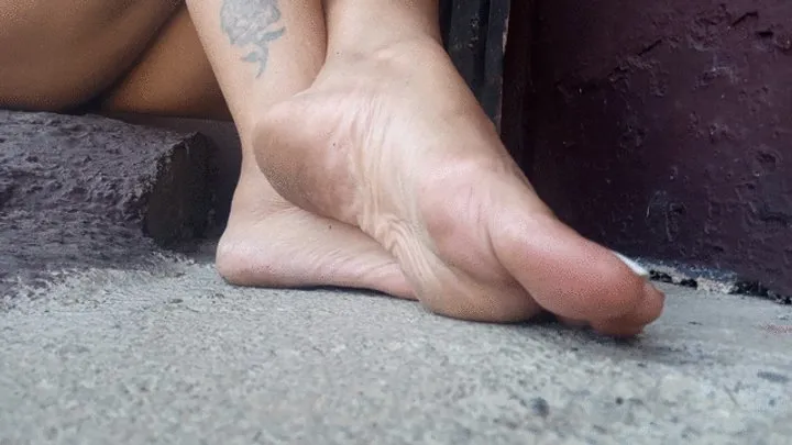 Wrinkled soles and pronounced arches very close up (3)