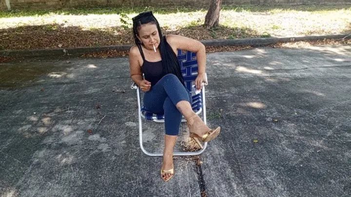 Roxan smoking and with her mules dangling from her wonderful feet (3)