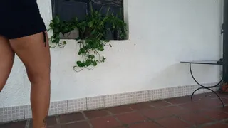 Woman scratching her feet while wearing flip-flops (3)