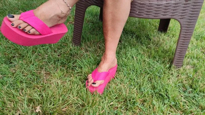 My fuchsia flip flops hanging from my beautiful feet (1)