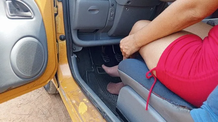 Scratching his feet after pumping car pedals (3)