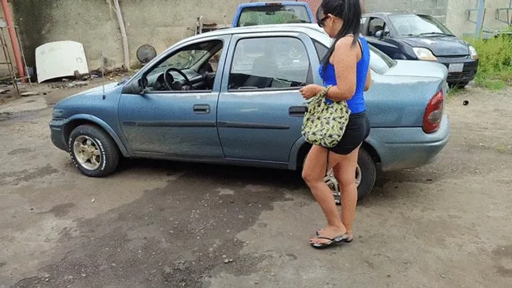 2 women pump car pedals with high heels and try to start it (1)