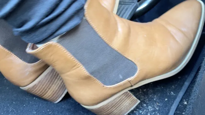 Pedal Pumping in Brown Boots - See my boots from the sides, underneath of the soles pumping the pedals in my Tesla