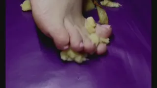 Smashing banana between My barefeet