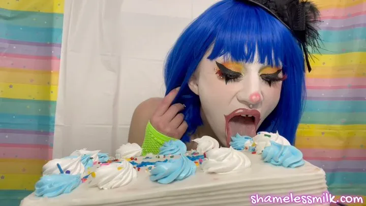 Cute Clown Plays with a Balloon & Cake