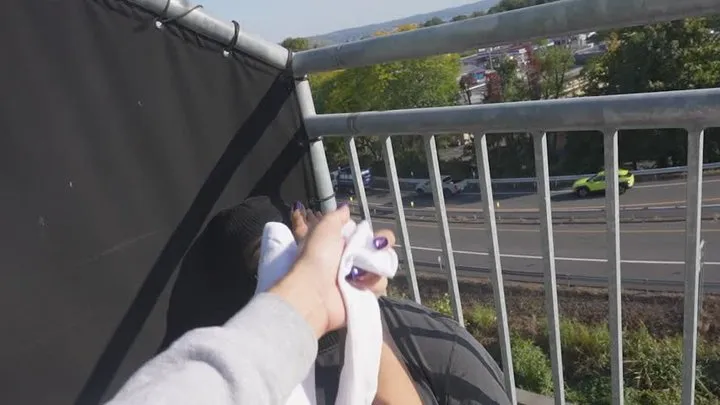 PainfulPleasure Smothers Her Best Friend With Her Stinky Feet Then Gives Him A FootJob On Balcony For Everyone to see