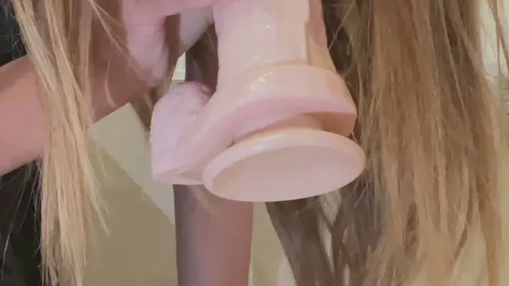 Squirting on a huge dildo!