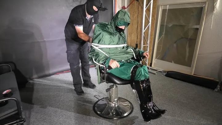 Marie M taped and gagged in shiny nylon rainwear