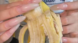 #22 - Touching banana and shiny nails