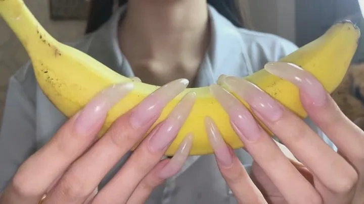 #127 - Long clear nails on banana