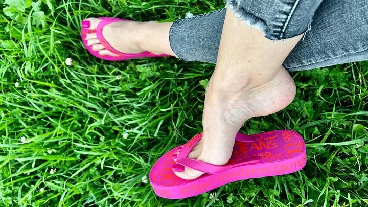 My new pink flip flops and my feet with pink toenails polish