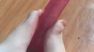 Footjob in a dildo