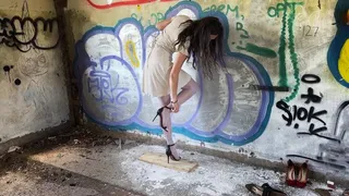 Sinking high heels in wooden plank, high heels bending, one heel standing, high heels crush