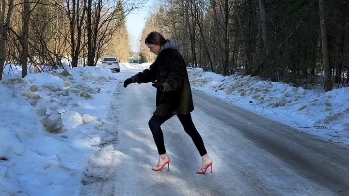 Girl on high heels on ice, flip flops on ice, mules on ice, high heels on ice, slippery high heels