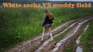 Muddy knee high white socks, knee high white socks on muddy field, wet knee high white sock