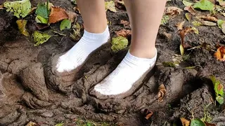 Muddy white ankle socks, dirty white socks, wet white socks, ankle socks dirty, ankle socks in mud, socks posing