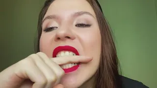 biting my finger (red lips)