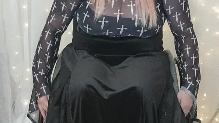 Paralyzed goth girl puts on leg braces